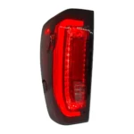 GMC Sierra 1500 tail light assembly, illuminated view